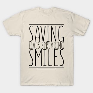 Saving lives spreading smiles T-Shirt